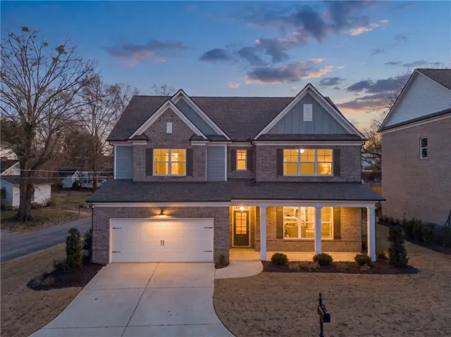 Brick and siding exterior with gabled roof lines