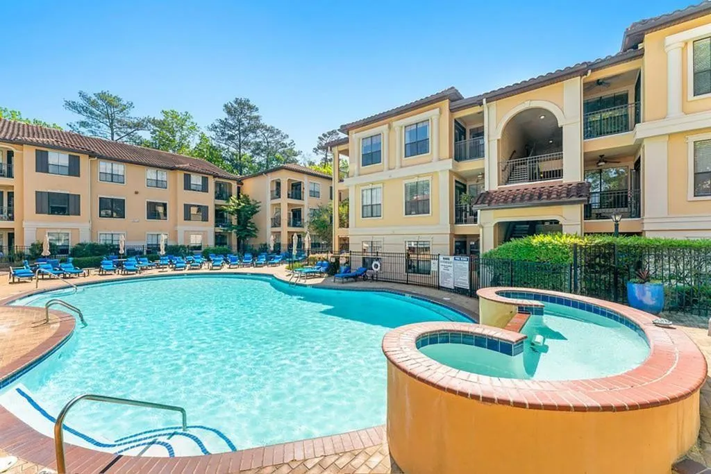 HOA fees include Gated Entry, 24/7 Security, Clubhouse w/ Concierge Service, Fitness Center, Resort-Style Pool, Theater Room, Game Room, Office Space, Grilling Areas, & Dog Park. Trash Pickup twice per week outside your door!