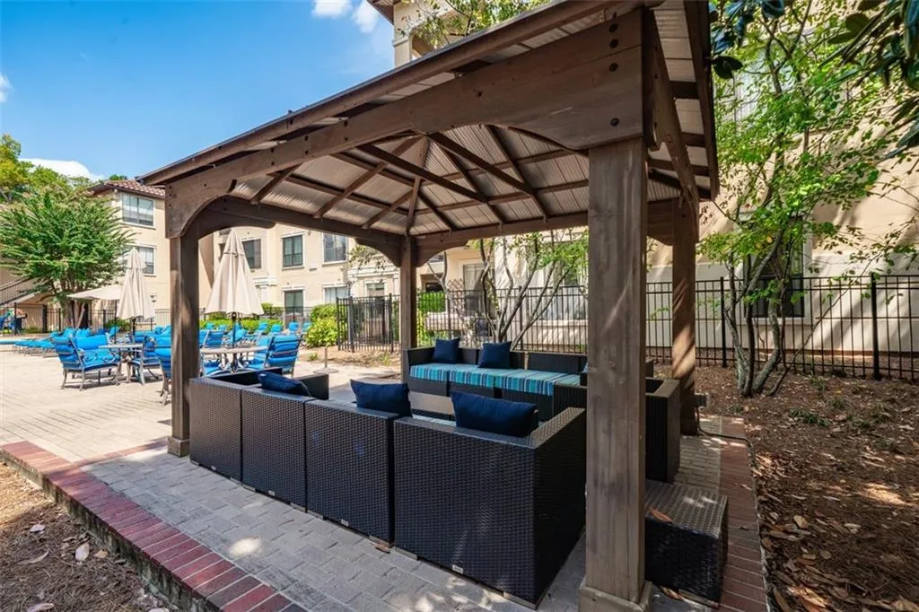 View of patio / terrace featuring outdoor lounge area and a gazebo