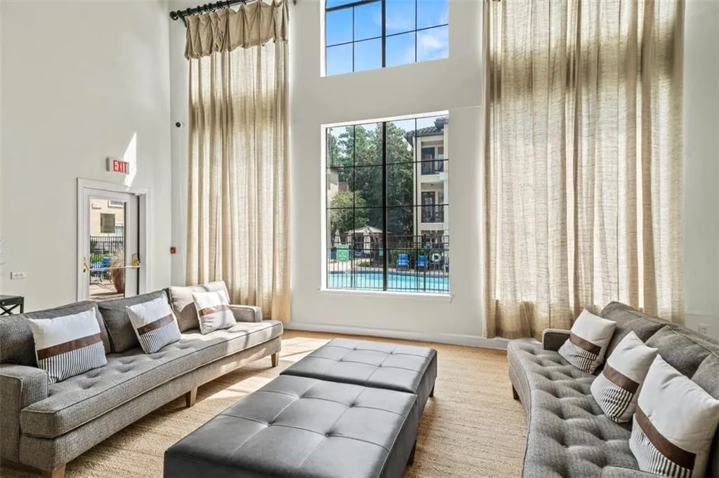 Living room with a high ceiling and plenty of natural light