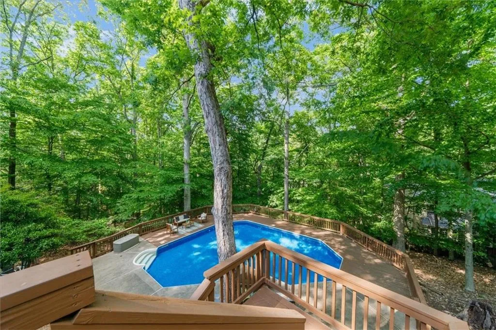 Swimming pool featuring a deck
