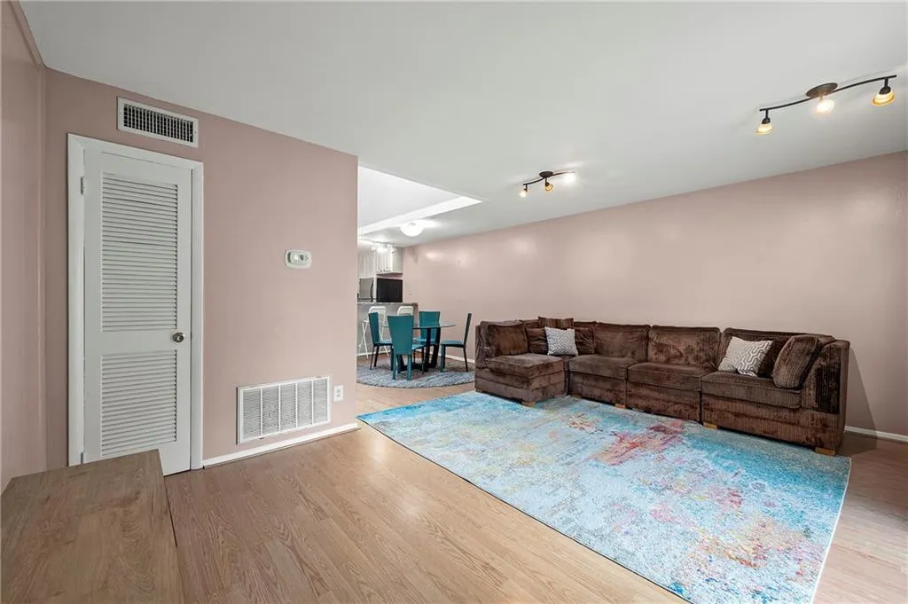 Living area featuring track lighting