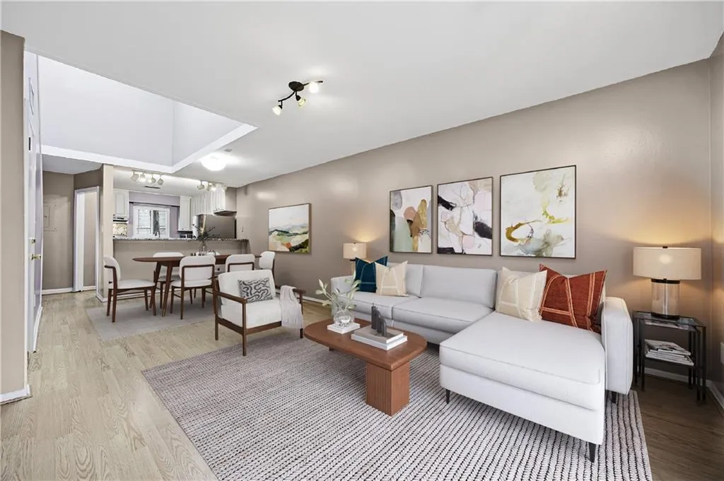Living room with light wood-style floors 
*Virtually Staged