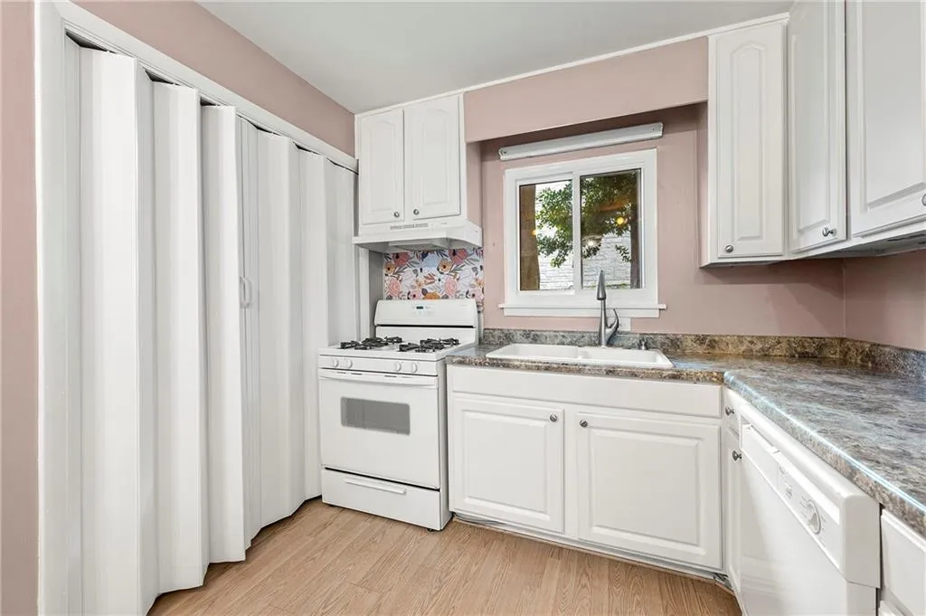 Kitchen with laundry closet