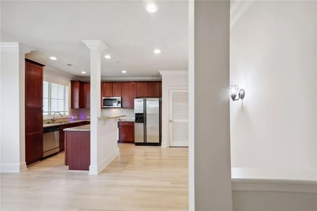 Foyer entrance into the living room and kitchen area.