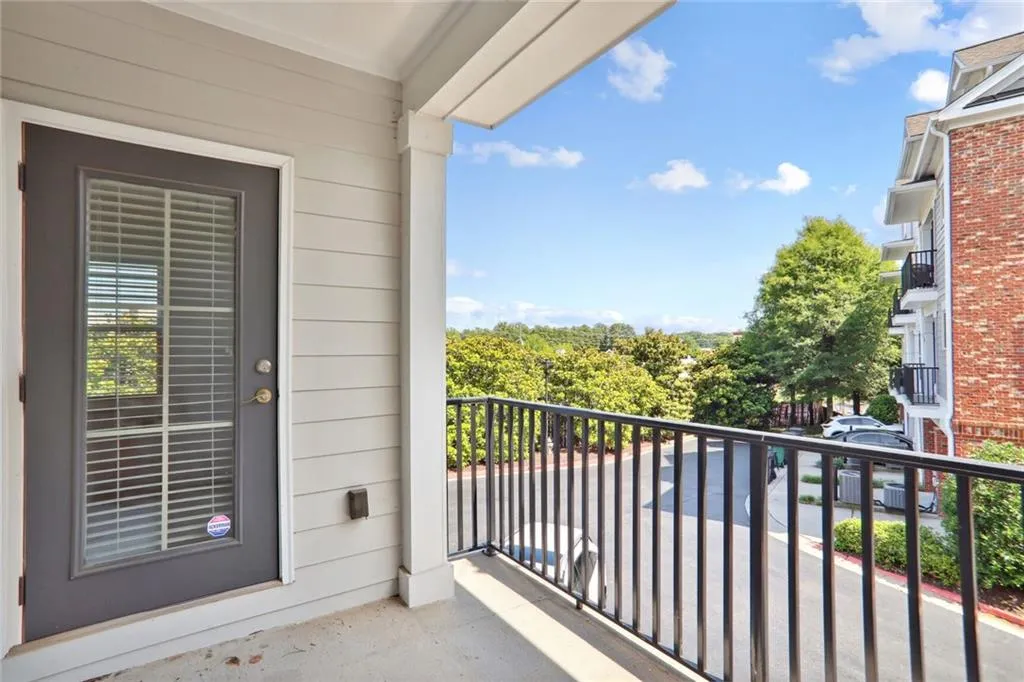 Covered balcony with a view of Sandy Springs.