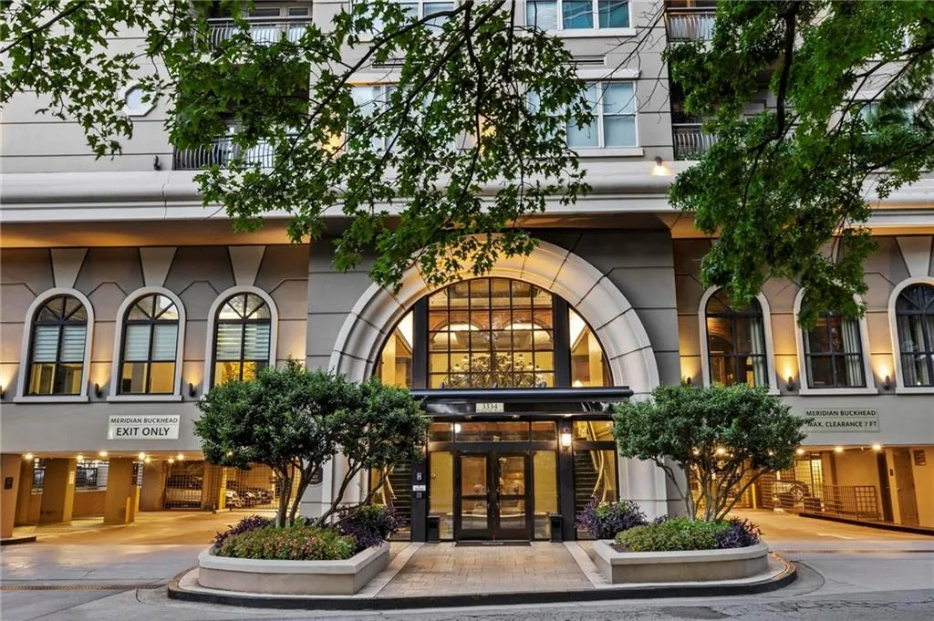 Front entrance on Tower Place Dr w/guest parking