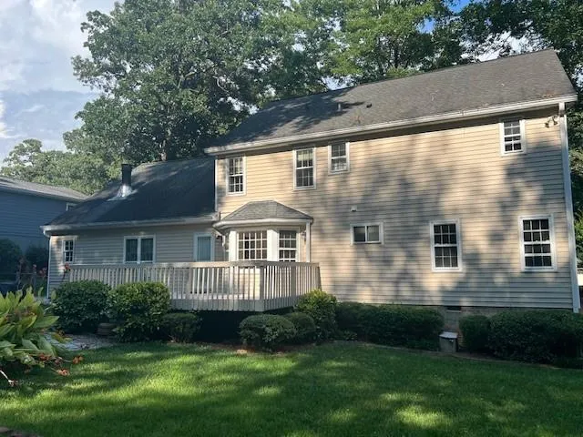 Rear of home with large deck.