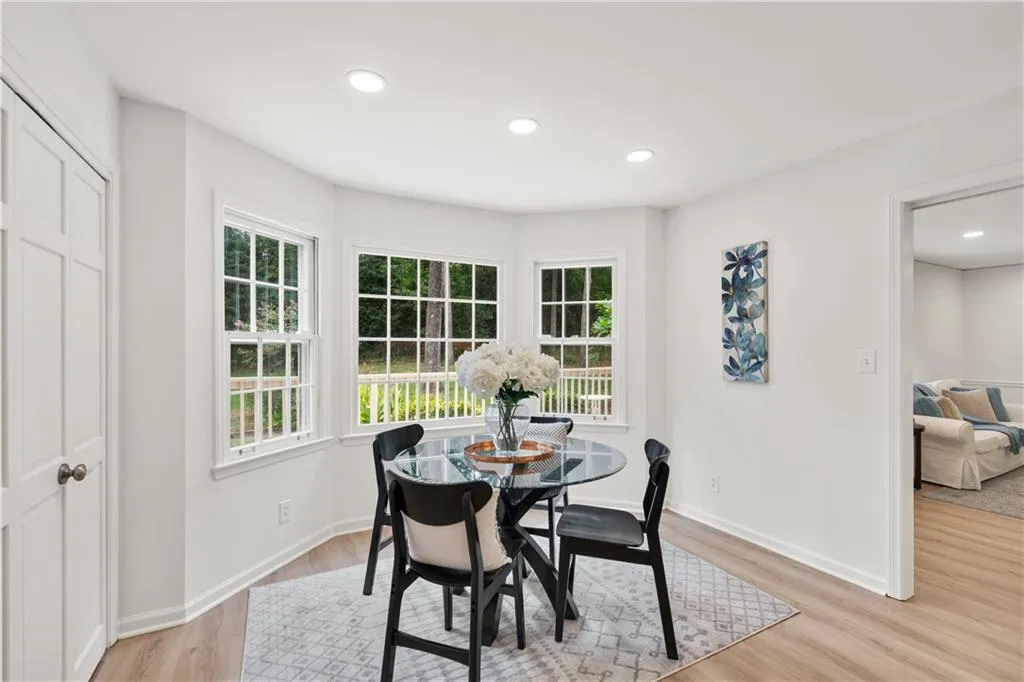 Breakfast area with bay window with beautiful view of back yard.
