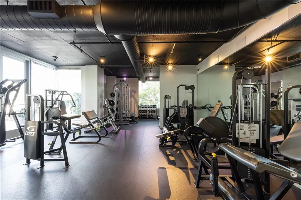 Two-level fitness center with extensive equipment