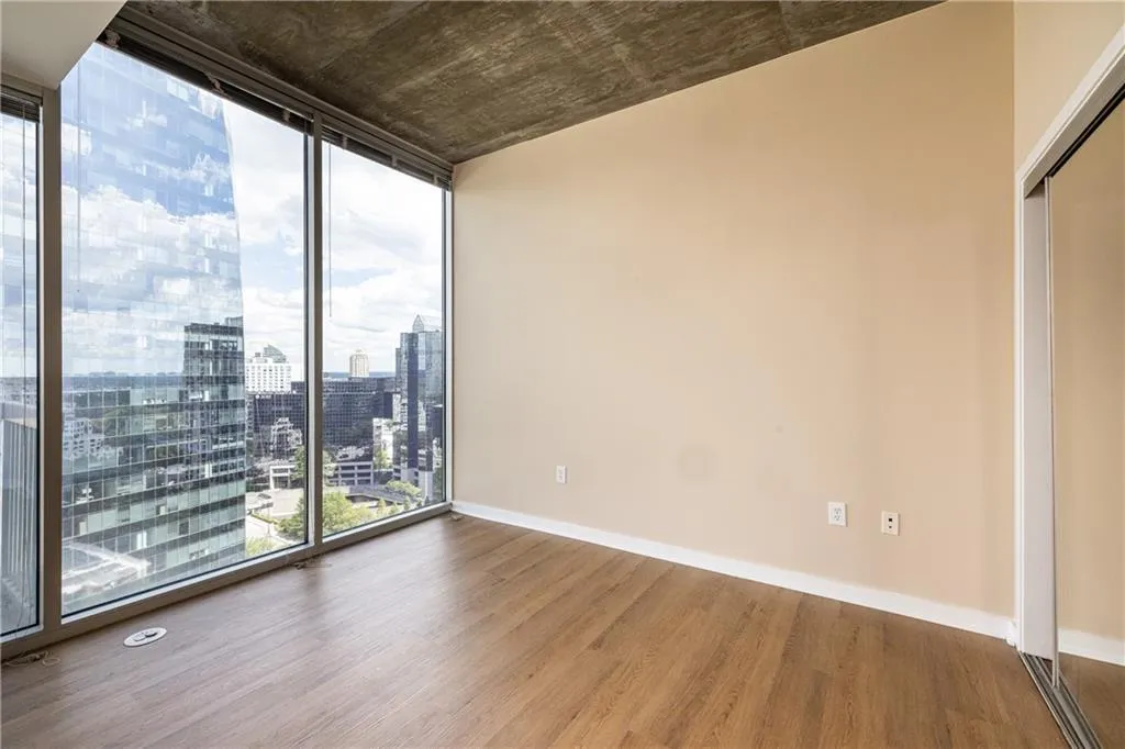 Flexible living and dining space with skyline views