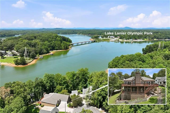 Elevated property with a multi-level deck, direct water frontage, and a covered boat dock