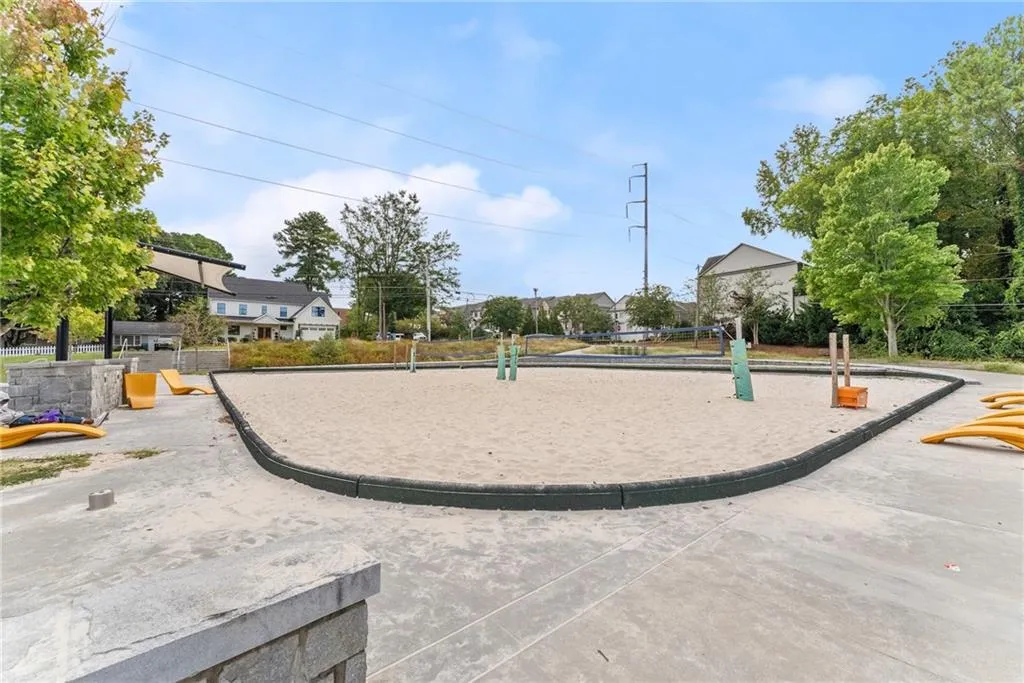 Surrounding community featuring volleyball court