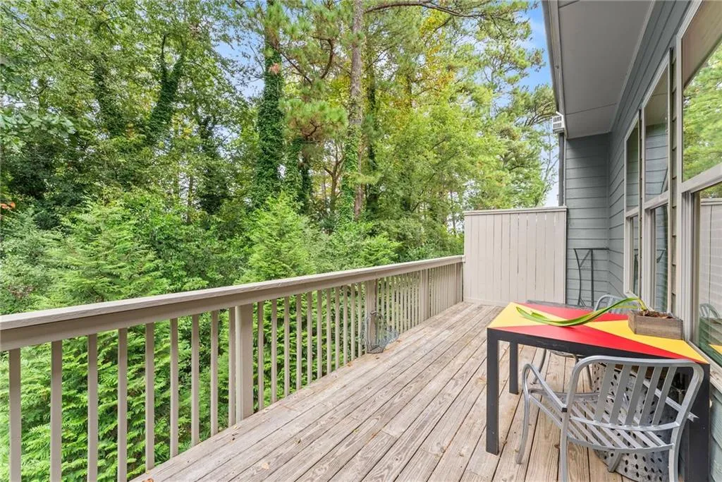 Deck with view of scattered trees