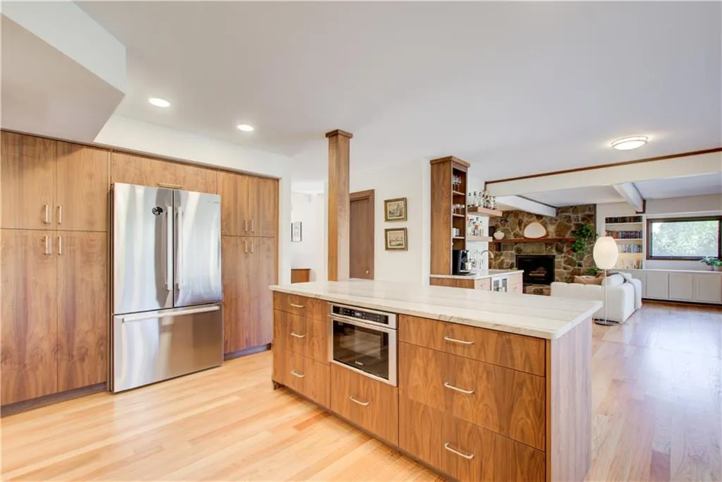 Bosh appliances and custom walnut cabinetry make this kitchen perfect. A must see!