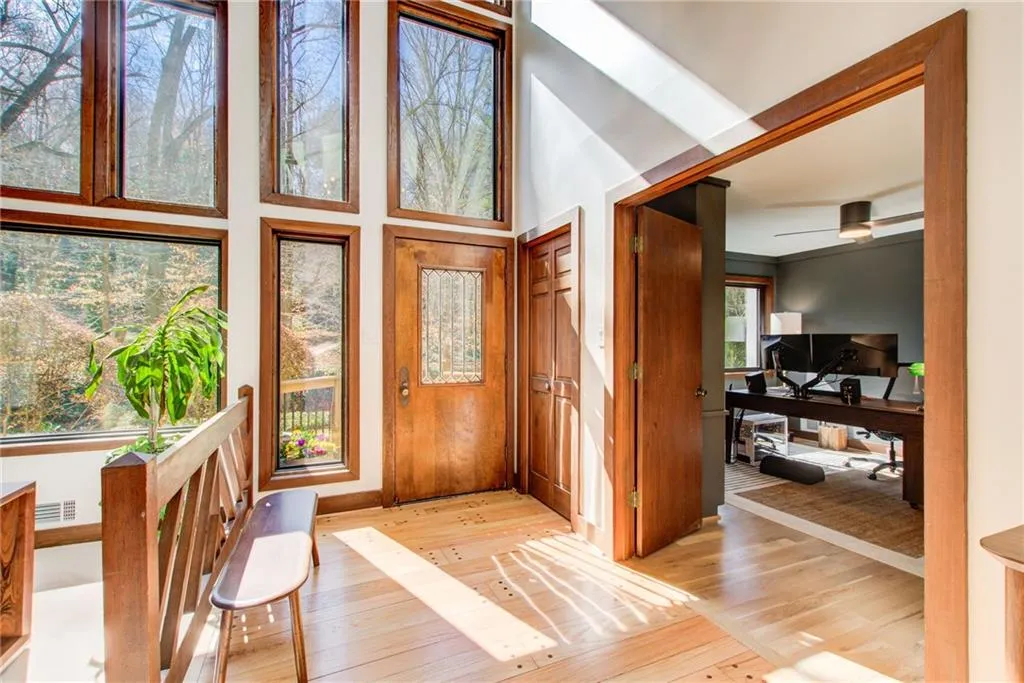 Entrance foyer featuring hardwood / wood-style flooring