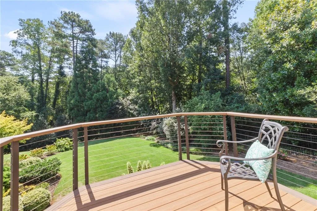 Deck with pool views from home office/flex room