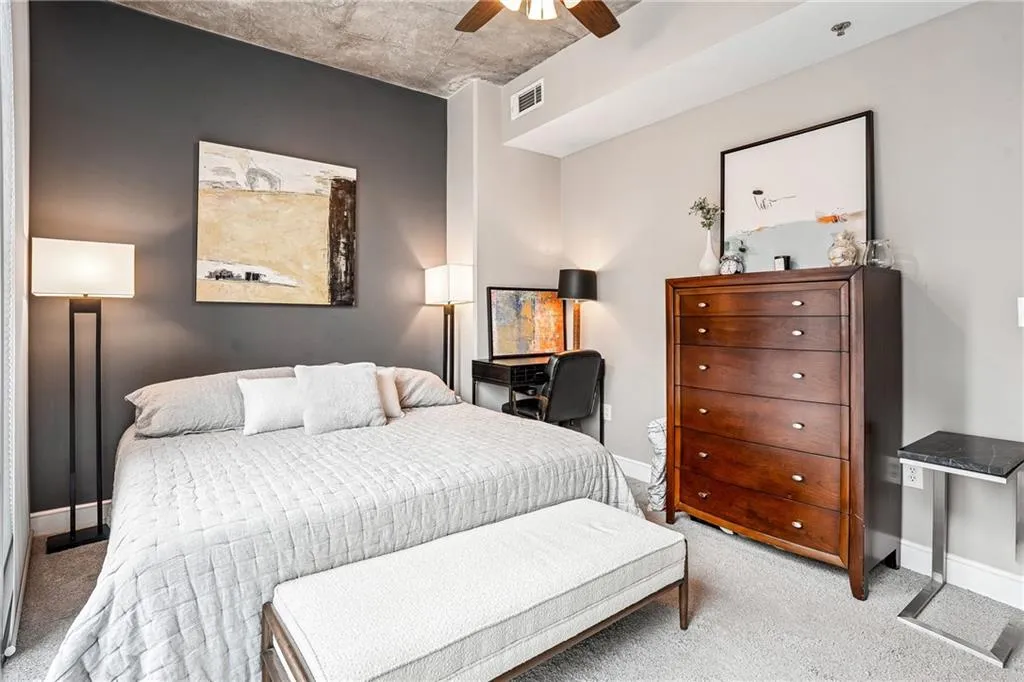 Bedroom featuring carpet flooring and ceiling fan