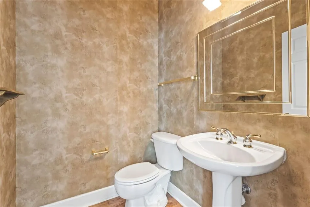 Powder room conveniently located on the main floor