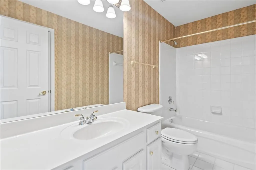This bathroom joins the guest bedroom and home office