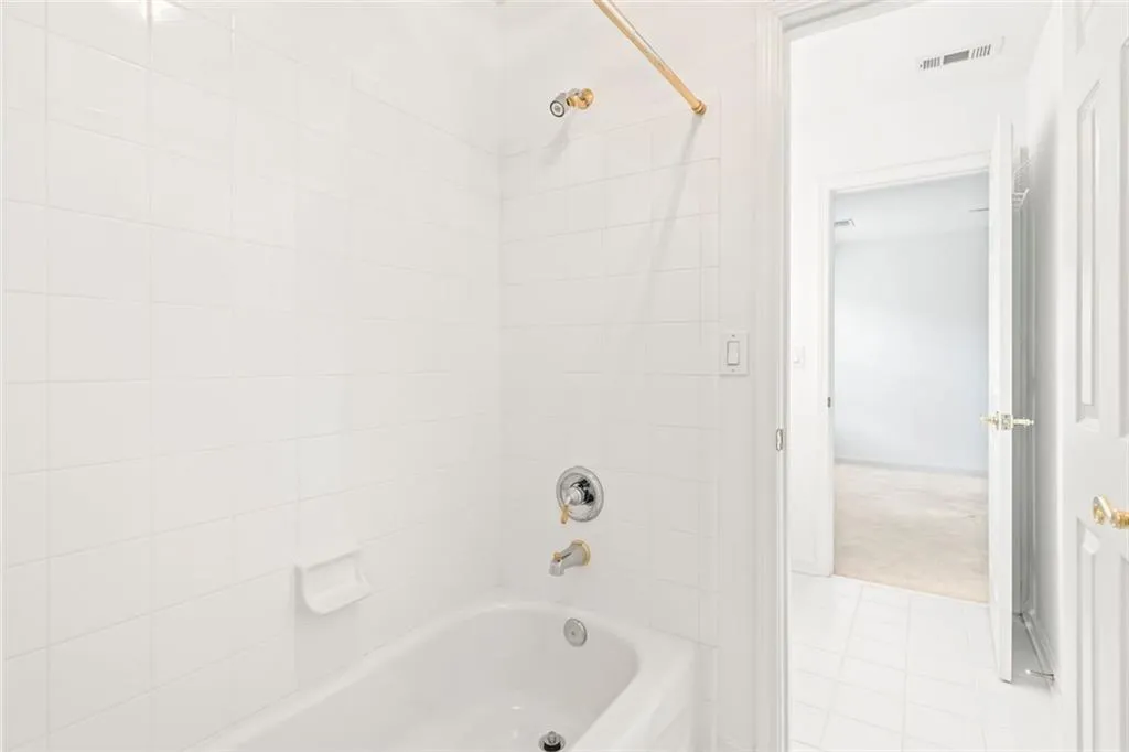 Bathroom with view into 4th bedroom