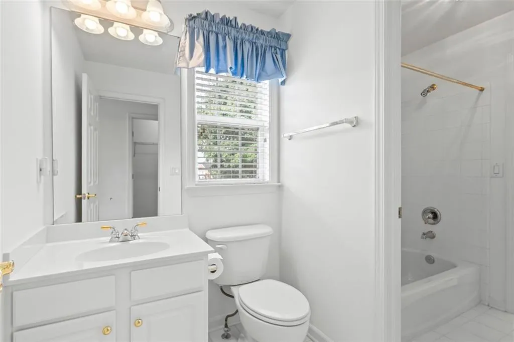 Jack-n-Jill bath adjoins the two bedrooms on this side of upstairs