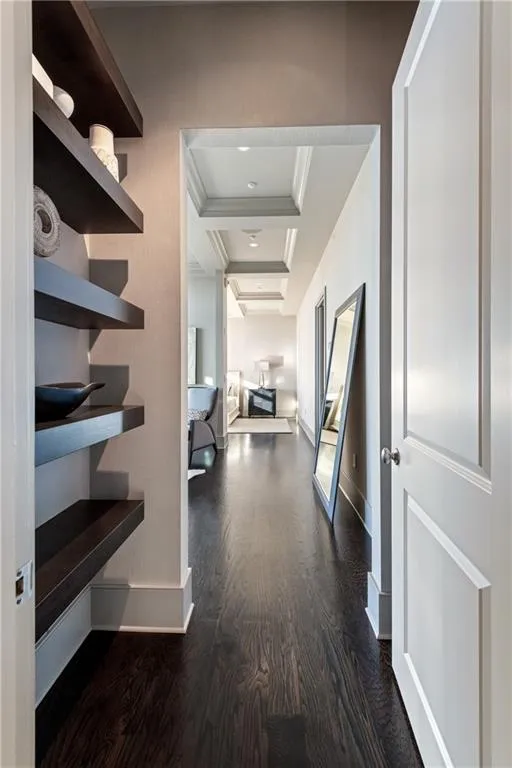 Hallway to the primary bedroom suite