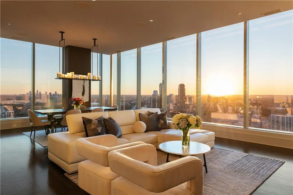 Living/dining room with a sunset view