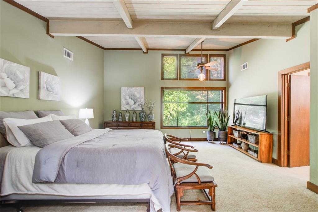 Primary bedroom with lots of beautiful light.