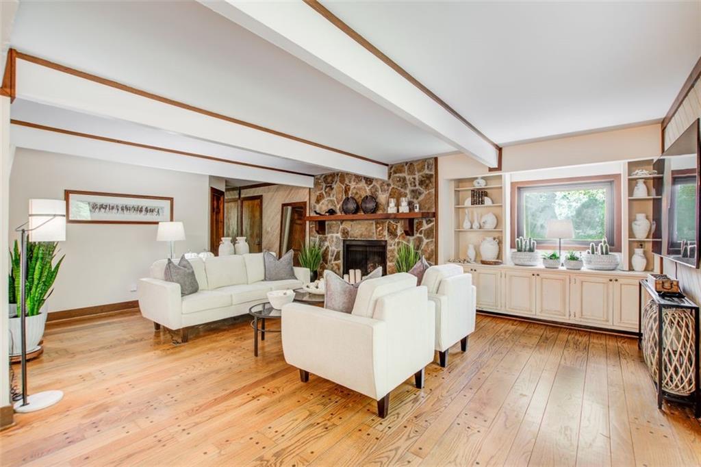 Fireside keeping room with build in's and open to the kitchen.
