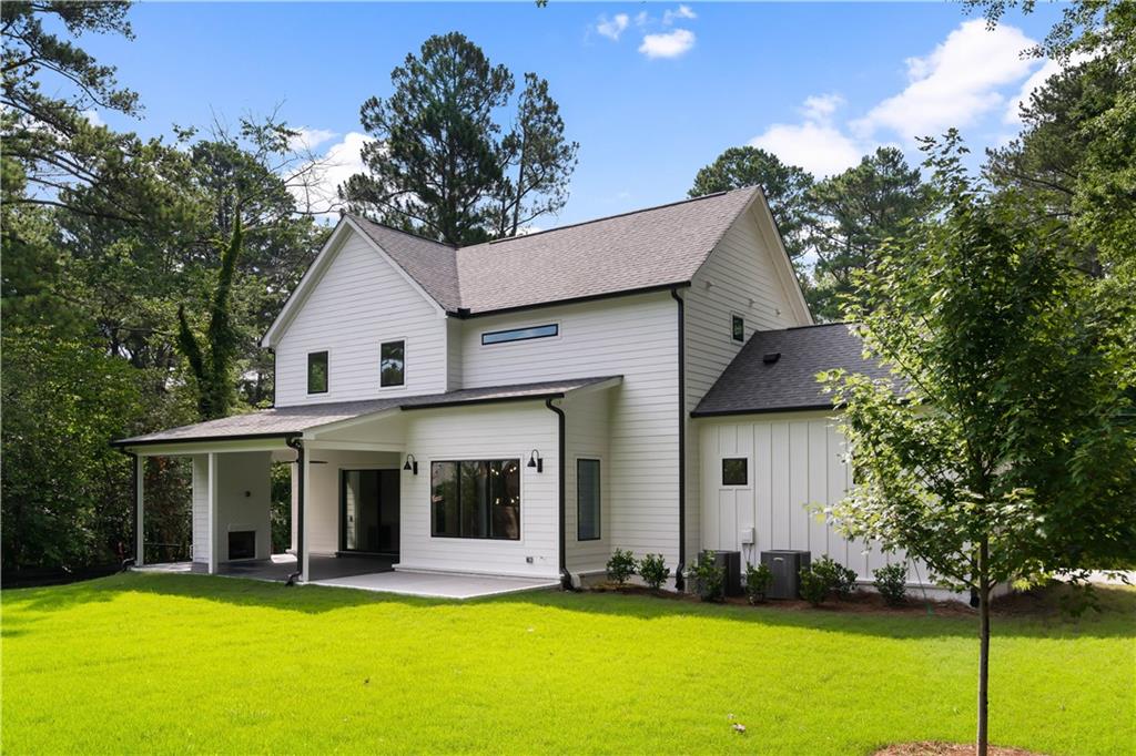 . Outside, the property offers a flat walk-out backyard, featuring a covered outdoor lounge with a fireplace and grilling patio—an ideal canvas for a future pool.