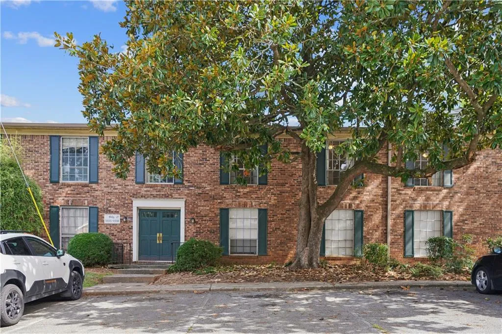 Colonial house with brick siding
