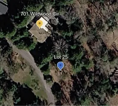 Satellite Imagery. Depicting the property at 701 Wildwood Cir and Lot 25