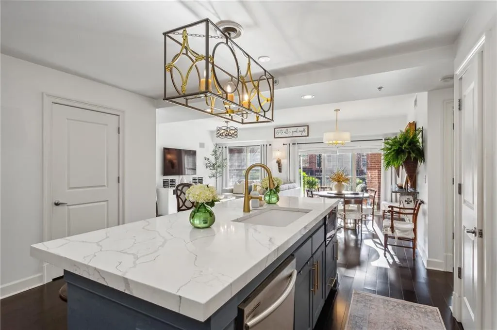 Kitchen with view to living and dining area