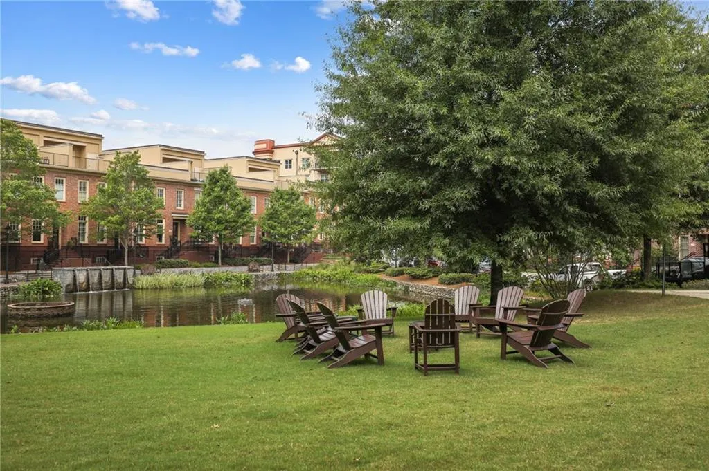 One of the property's community areas with seating area and water feature