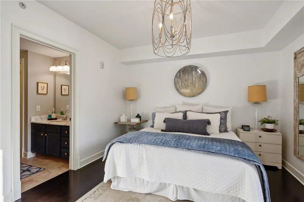 Primary Bedroom with gorgeous chandelier