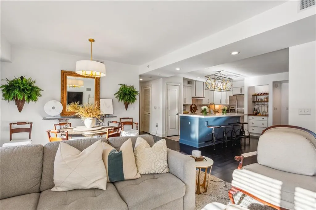 Living room view to kitchen and dining