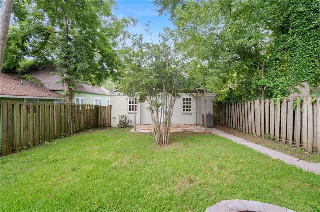 View of fenced backyard