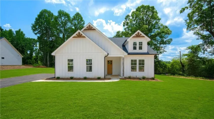 This is a Virtual Rendering of this New Construction home!  Lovely Modern Farmhouse sits on 1.3 acres NO HOA!