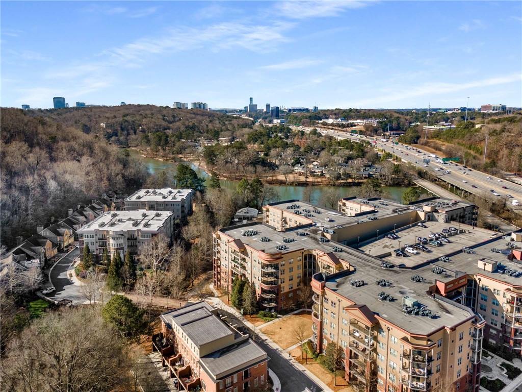 The community also sits along the banks of the Chattahoochee River! You are about 1/2 mile from the entrance of Cochran Shoals and it's all accessible via sidewalks and bike paths! You can even launch your kayak, canoe or float directly from the property!