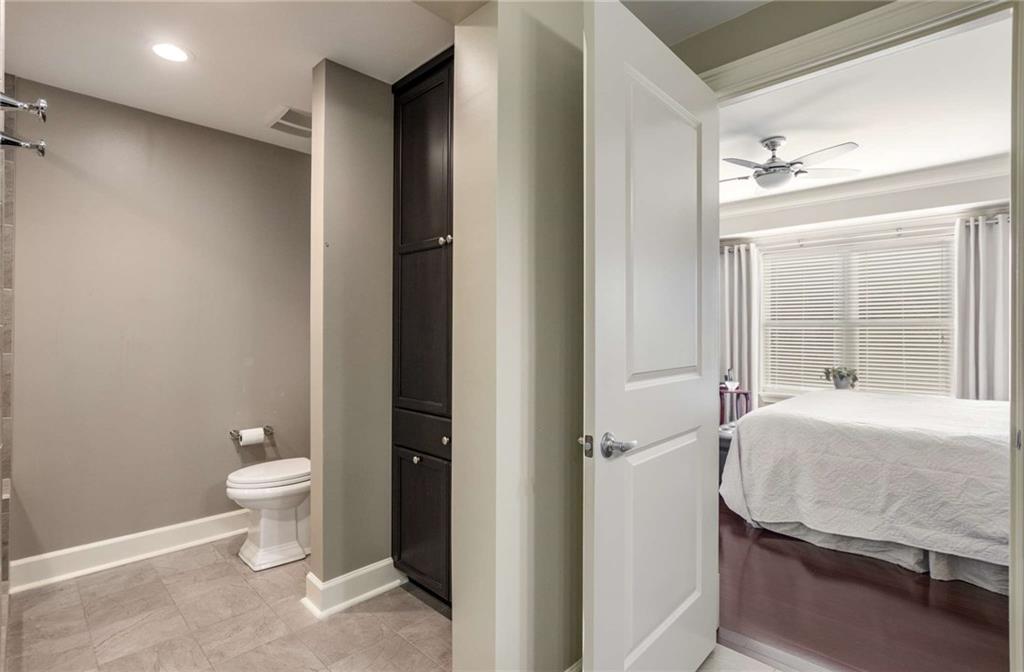 Need more bathroom storage?  A feature that most primary baths do not have is this built in linen closet.  Includes a built in hamper plus deep shelves for tons of storage space!  This used to be the shower stall to give you an idea of how big it is inside.  The tub was replaced with that wonderful walk in shower!
