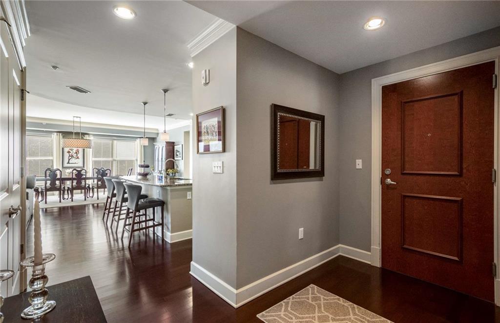 Round the corner from the front door, you will be wowed by the size of the living area.  Again, there are only 12 three bedroom condos in the entire building so they are very much in demand.