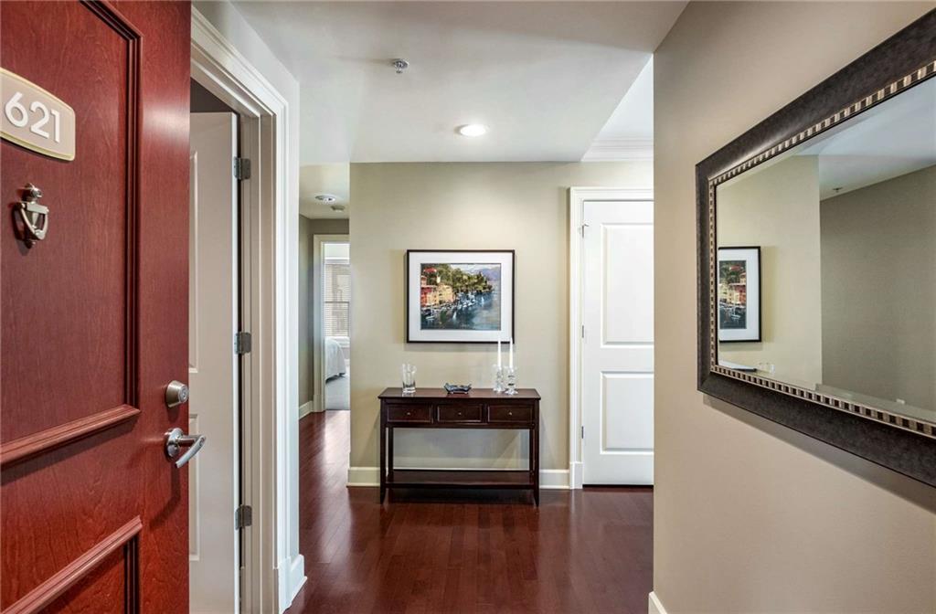 Entering in the condo, you are welcomed with natural light and plenty of wall space for your favorite art pieces. Unit comes with 2 covered parking spaces on the 6th floor and a private storage unit on the 1st floor!  Grocery shopping is easy when you can enter on the same level as your unit!