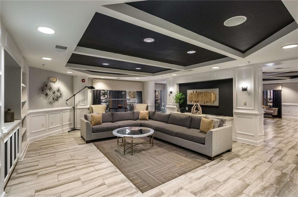 The lobby of the River House has wonderful amenities itself.  It's own Concierge, tv, waiting area and lounge.  Great spot to meet a visiting friend or catch up with a neighbor. This space has been recently updated and it's beautiful!