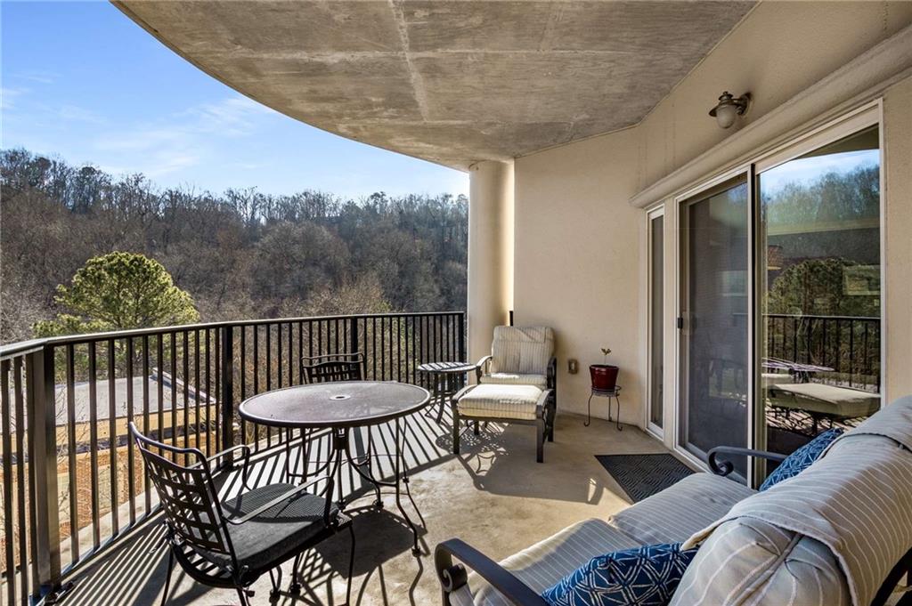 The balcony overlooks the creek and wooded area. You really do feel like you are in a tree house.  Having a covered balcony helps protect your furniture from inclement weather.