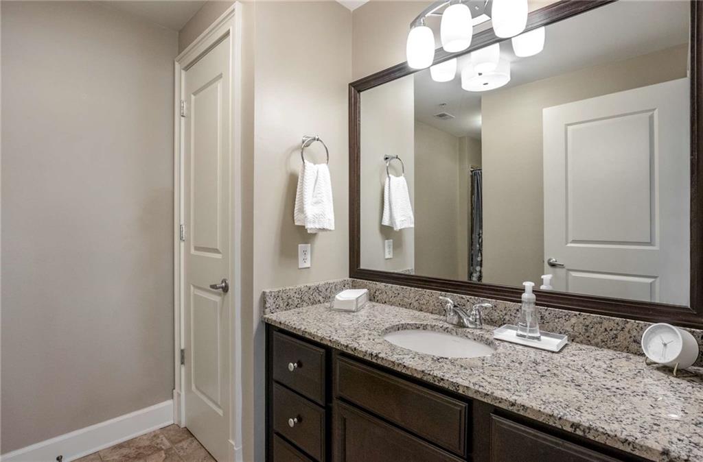 Granite countertops and lots of storage space in the guest bath.  The second full bathroom also has a quiet high speed fan and another linen closet.  This condo has so much storage!