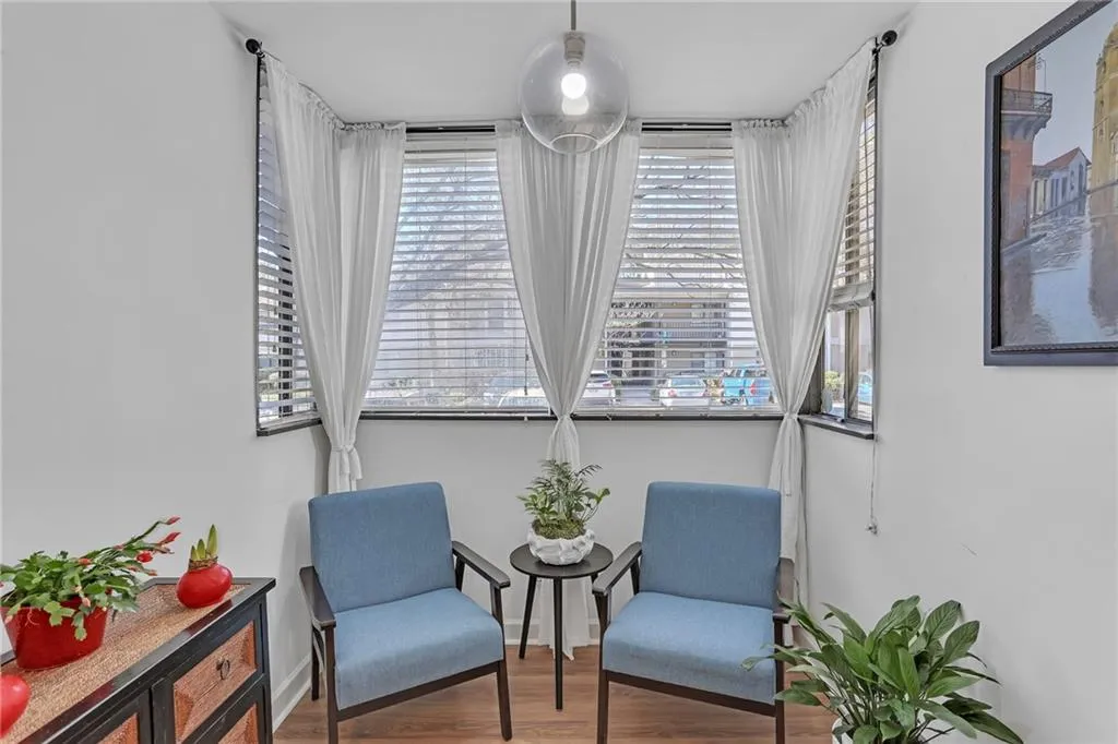 Living area featuring plenty of natural light and wood finished floors