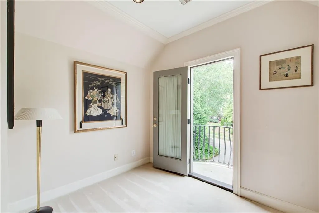 A quaint reading nook with Juliet balcony is a surprise feature!