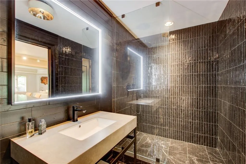 Brand new designer bathroom on terrace level with walk-in tile shower