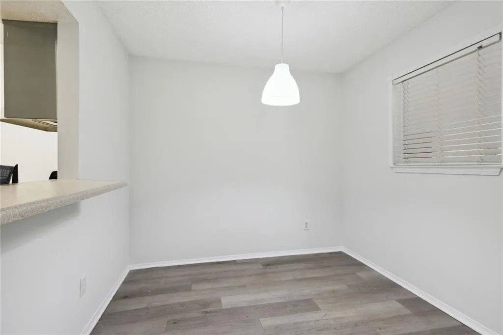 Separate dining room with access to kitchen serving or breakfast bar!